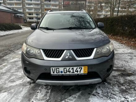 Серый Мицубиси Аутлендер, объемом двигателя 2.2 л и пробегом 200 тыс. км за 4600 $, фото 1 на Automoto.ua