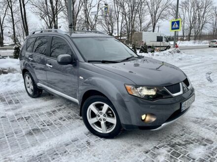 Сірий Міцубісі Аутлендер, об'ємом двигуна 2.4 л та пробігом 217 тис. км за 8750 $, фото 1 на Automoto.ua