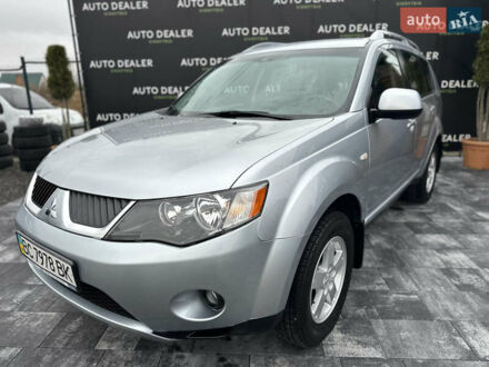 Серый Мицубиси Аутлендер, объемом двигателя 2.4 л и пробегом 61 тыс. км за 11300 $, фото 1 на Automoto.ua