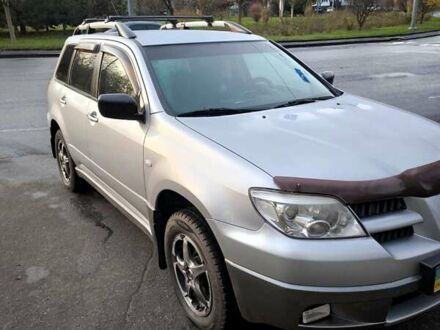 Сірий Міцубісі Аутлендер, об'ємом двигуна 2 л та пробігом 161 тис. км за 7500 $, фото 1 на Automoto.ua