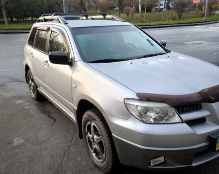 Сірий Міцубісі Аутлендер, об'ємом двигуна 2 л та пробігом 161 тис. км за 7500 $, фото 1 на Automoto.ua