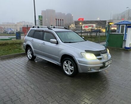 Сірий Міцубісі Аутлендер, об'ємом двигуна 2.4 л та пробігом 299 тис. км за 6300 $, фото 1 на Automoto.ua