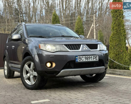 Серый Мицубиси Аутлендер, объемом двигателя 1.97 л и пробегом 242 тыс. км за 8999 $, фото 1 на Automoto.ua