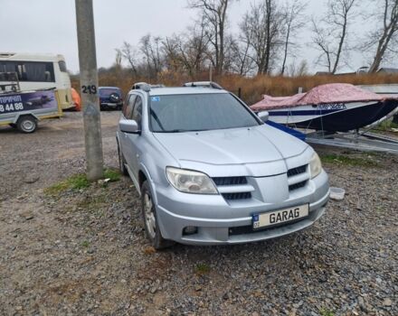 Серый Мицубиси Аутлендер, объемом двигателя 2.4 л и пробегом 350 тыс. км за 8000 $, фото 1 на Automoto.ua