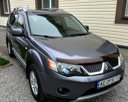 Серый Мицубиси Аутлендер, объемом двигателя 2.4 л и пробегом 153 тыс. км за 11500 $, фото 1 на Automoto.ua