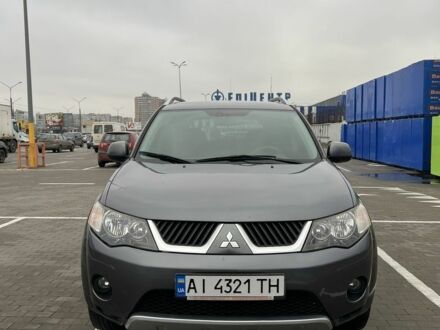 Серый Мицубиси Аутлендер, объемом двигателя 2.4 л и пробегом 173 тыс. км за 8600 $, фото 1 на Automoto.ua