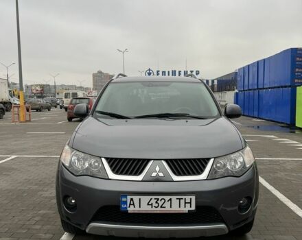 Серый Мицубиси Аутлендер, объемом двигателя 2.4 л и пробегом 173 тыс. км за 8600 $, фото 1 на Automoto.ua