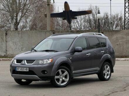 Серый Мицубиси Аутлендер, объемом двигателя 2 л и пробегом 275 тыс. км за 8500 $, фото 1 на Automoto.ua
