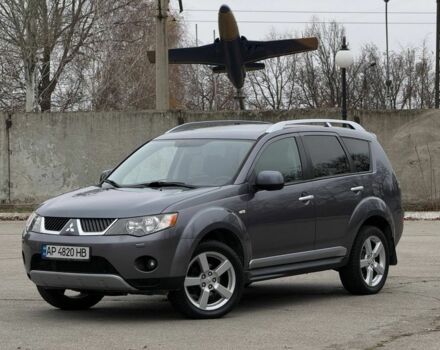 Серый Мицубиси Аутлендер, объемом двигателя 2 л и пробегом 275 тыс. км за 8500 $, фото 1 на Automoto.ua