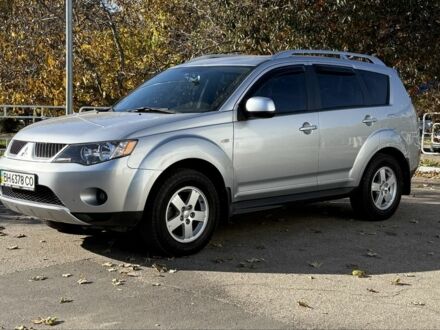 Серый Мицубиси Аутлендер, объемом двигателя 2.4 л и пробегом 43 тыс. км за 9500 $, фото 1 на Automoto.ua