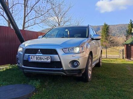Серый Мицубиси Аутлендер, объемом двигателя 2.2 л и пробегом 236 тыс. км за 10500 $, фото 1 на Automoto.ua