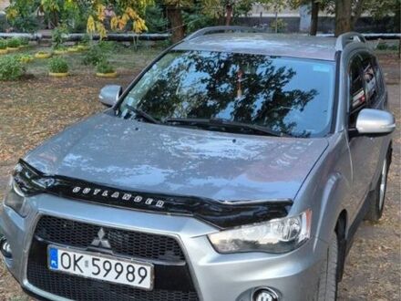 Сірий Міцубісі Аутлендер, об'ємом двигуна 2 л та пробігом 343 тис. км за 9450 $, фото 1 на Automoto.ua