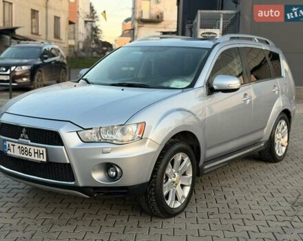 Серый Мицубиси Аутлендер, объемом двигателя 2.18 л и пробегом 294 тыс. км за 10799 $, фото 1 на Automoto.ua