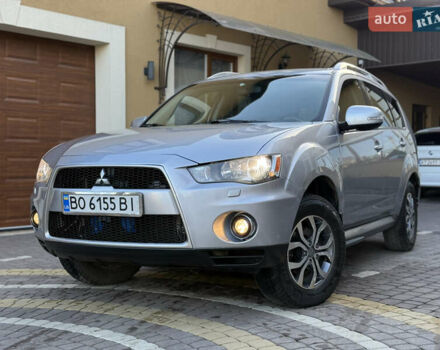 Серый Мицубиси Аутлендер, объемом двигателя 2.4 л и пробегом 218 тыс. км за 9950 $, фото 1 на Automoto.ua