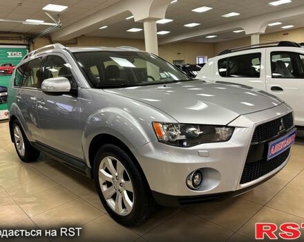 Серый Мицубиси Аутлендер, объемом двигателя 2.4 л и пробегом 182 тыс. км за 10800 $, фото 1 на Automoto.ua