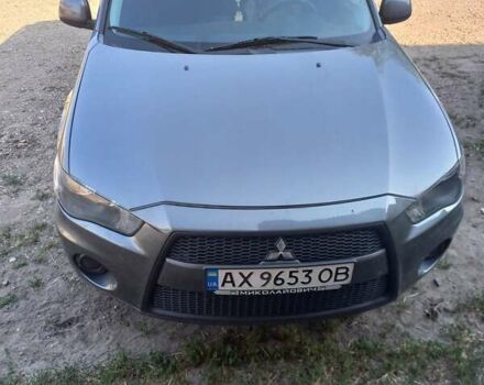 Сірий Міцубісі Аутлендер, об'ємом двигуна 2.36 л та пробігом 145 тис. км за 10500 $, фото 1 на Automoto.ua