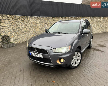 Серый Мицубиси Аутлендер, объемом двигателя 2.2 л и пробегом 230 тыс. км за 11000 $, фото 1 на Automoto.ua