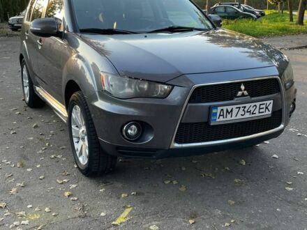 Серый Мицубиси Аутлендер, объемом двигателя 2.4 л и пробегом 138 тыс. км за 9000 $, фото 1 на Automoto.ua