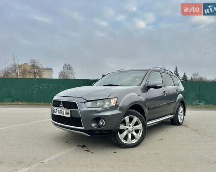 Серый Мицубиси Аутлендер, объемом двигателя 2.4 л и пробегом 270 тыс. км за 8450 $, фото 1 на Automoto.ua