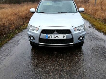 Серый Мицубиси Аутлендер, объемом двигателя 2.2 л и пробегом 25500 тыс. км за 10200 $, фото 1 на Automoto.ua