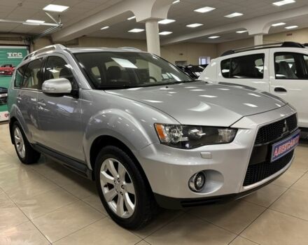 Серый Мицубиси Аутлендер, объемом двигателя 2.4 л и пробегом 182 тыс. км за 10800 $, фото 1 на Automoto.ua