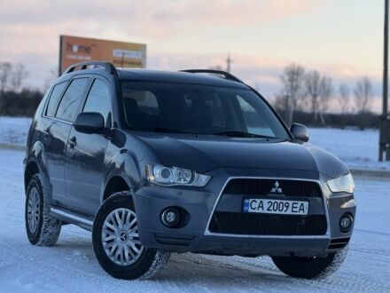 Серый Мицубиси Аутлендер, объемом двигателя 2.2 л и пробегом 232 тыс. км за 9650 $, фото 1 на Automoto.ua
