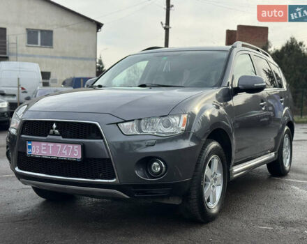 Серый Мицубиси Аутлендер, объемом двигателя 2.2 л и пробегом 211 тыс. км за 11999 $, фото 1 на Automoto.ua