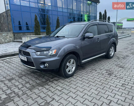 Серый Мицубиси Аутлендер, объемом двигателя 2.27 л и пробегом 258 тыс. км за 11900 $, фото 1 на Automoto.ua