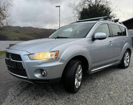 Серый Мицубиси Аутлендер, объемом двигателя 2.3 л и пробегом 279 тыс. км за 4642 $, фото 1 на Automoto.ua
