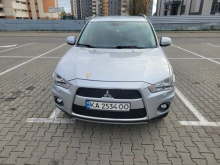 Серый Мицубиси Аутлендер, объемом двигателя 2.2 л и пробегом 175 тыс. км за 10999 $, фото 1 на Automoto.ua