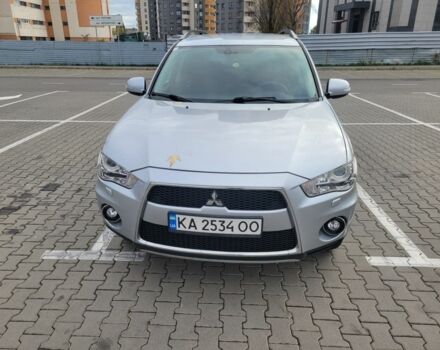 Серый Мицубиси Аутлендер, объемом двигателя 2.2 л и пробегом 175 тыс. км за 10999 $, фото 1 на Automoto.ua