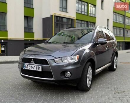 Серый Мицубиси Аутлендер, объемом двигателя 2.27 л и пробегом 291 тыс. км за 9700 $, фото 1 на Automoto.ua