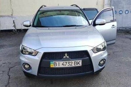 Мицубиси Аутлендер 2011 в Кременчуге на Automoto.ua Серый Мицубиси Аутлендер, объемом двигателя 2.4 л и пробегом 596 тыс. км за 7500 $, фото 1 на Automoto.ua