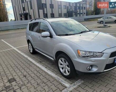 Серый Мицубиси Аутлендер, объемом двигателя 2.2 л и пробегом 175 тыс. км за 10999 $, фото 1 на Automoto.ua