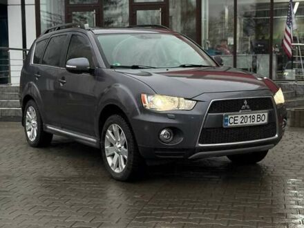 Серый Мицубиси Аутлендер, объемом двигателя 2.3 л и пробегом 160 тыс. км за 13900 $, фото 1 на Automoto.ua