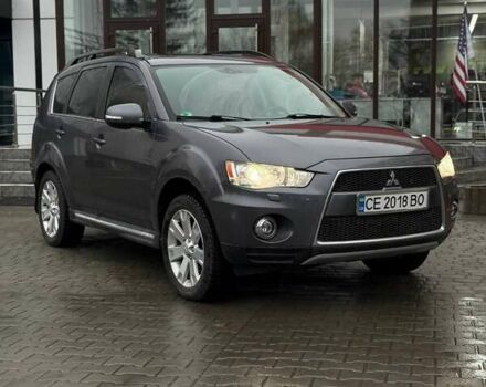 Сірий Міцубісі Аутлендер, об'ємом двигуна 2.3 л та пробігом 160 тис. км за 13900 $, фото 1 на Automoto.ua