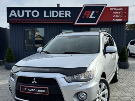 Серый Мицубиси Аутлендер, объемом двигателя 2.4 л и пробегом 239 тыс. км за 11700 $, фото 1 на Automoto.ua