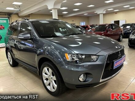 Серый Мицубиси Аутлендер, объемом двигателя 2.4 л и пробегом 16400 тыс. км за 10900 $, фото 1 на Automoto.ua