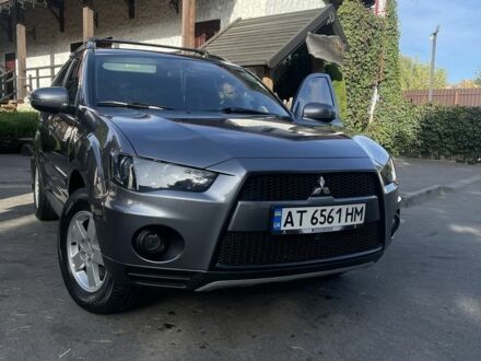 Серый Мицубиси Аутлендер, объемом двигателя 2 л и пробегом 136 тыс. км за 14999 $, фото 1 на Automoto.ua