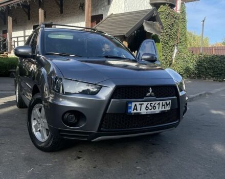 Серый Мицубиси Аутлендер, объемом двигателя 2 л и пробегом 136 тыс. км за 14999 $, фото 1 на Automoto.ua