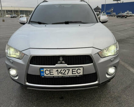Серый Мицубиси Аутлендер, объемом двигателя 2.27 л и пробегом 310 тыс. км за 10500 $, фото 1 на Automoto.ua