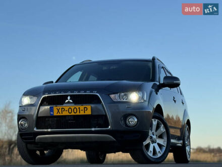 Серый Мицубиси Аутлендер, объемом двигателя 2.2 л и пробегом 171 тыс. км за 12700 $, фото 1 на Automoto.ua