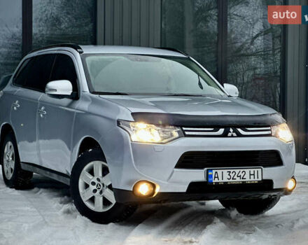 Серый Мицубиси Аутлендер, объемом двигателя 2.36 л и пробегом 228 тыс. км за 9999 $, фото 1 на Automoto.ua