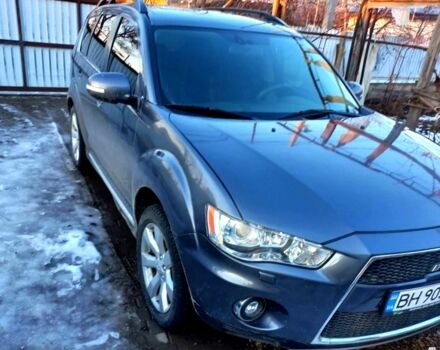 Серый Мицубиси Аутлендер, объемом двигателя 2.2 л и пробегом 27500 тыс. км за 9900 $, фото 1 на Automoto.ua