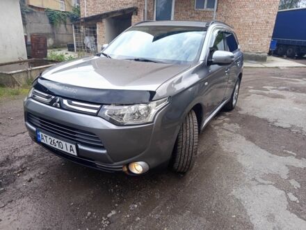 Серый Мицубиси Аутлендер, объемом двигателя 2.3 л и пробегом 248 тыс. км за 11550 $, фото 1 на Automoto.ua