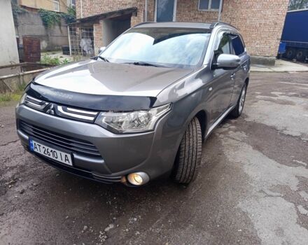 Серый Мицубиси Аутлендер, объемом двигателя 2.3 л и пробегом 248 тыс. км за 11550 $, фото 1 на Automoto.ua