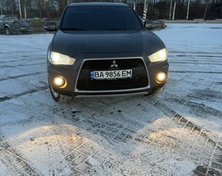 Серый Мицубиси Аутлендер, объемом двигателя 3 л и пробегом 220 тыс. км за 7500 $, фото 1 на Automoto.ua