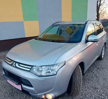 Серый Мицубиси Аутлендер, объемом двигателя 2.3 л и пробегом 187 тыс. км за 13700 $, фото 1 на Automoto.ua