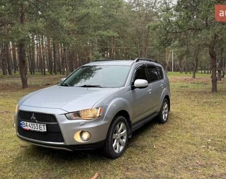 Серый Мицубиси Аутлендер, объемом двигателя 2.4 л и пробегом 240 тыс. км за 12300 $, фото 1 на Automoto.ua