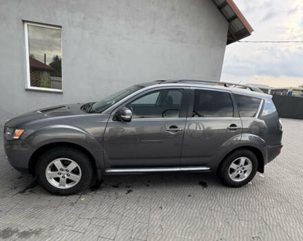 Серый Мицубиси Аутлендер, объемом двигателя 2.18 л и пробегом 261 тыс. км за 12500 $, фото 1 на Automoto.ua